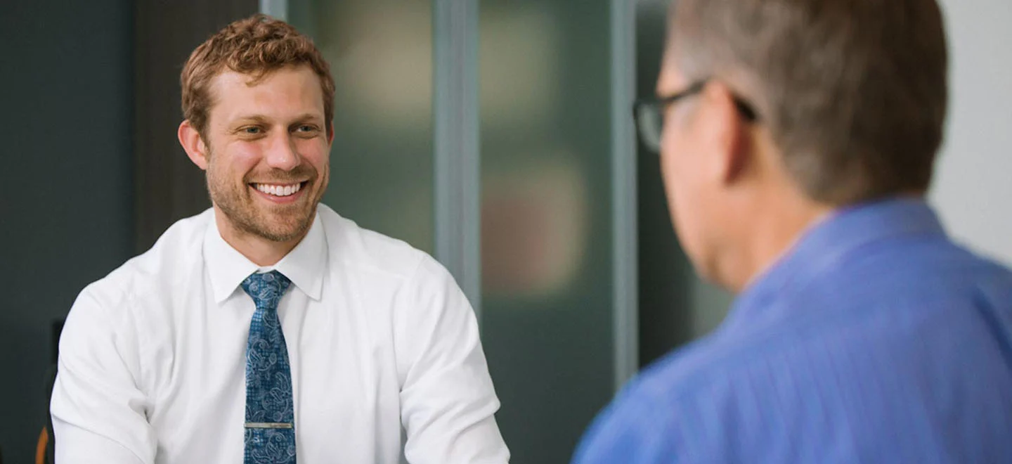 Jed McKeehan meeting with a client